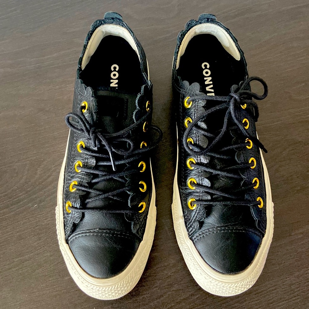 Women Converse size 7 black leather sneakers( runs 1/2 size bigger)
